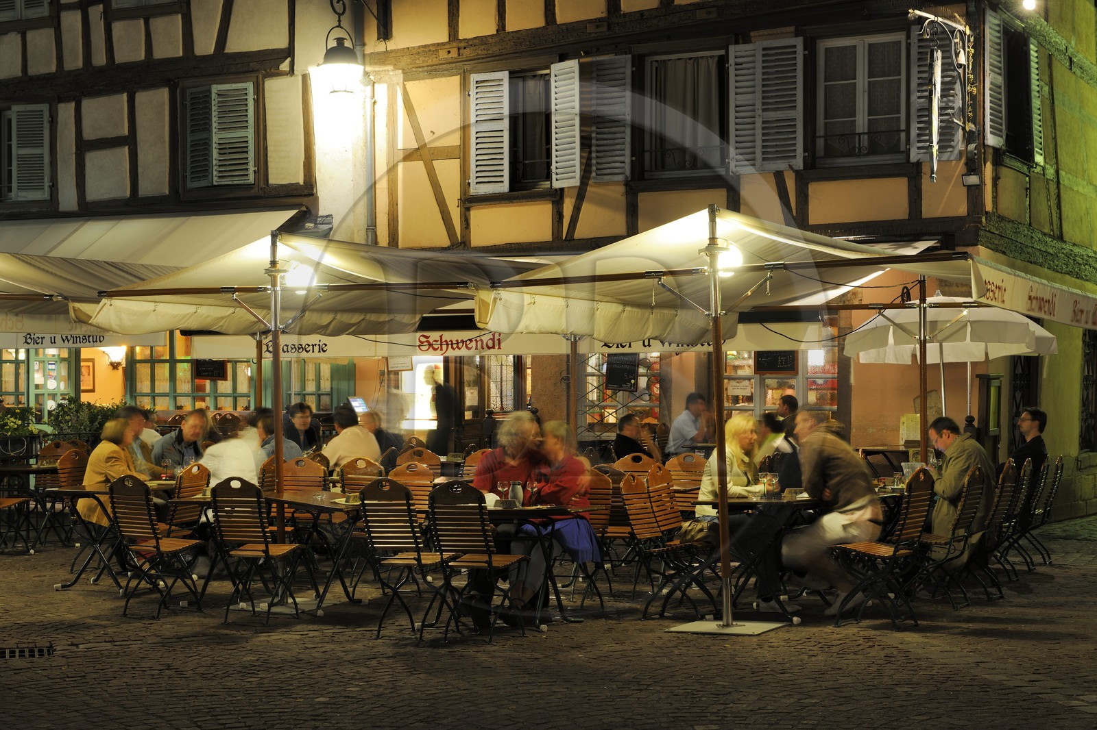 France, Haut Rhin, Colmar, Cafe terrace on the Place de l'Ancienne Douane