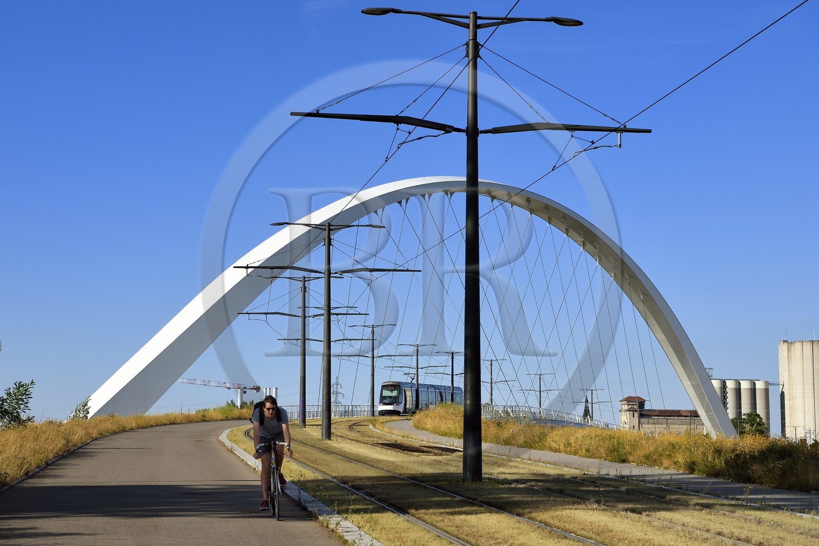 France, Bas Rhin, Strasbourg, the pedestrian, bicycle and tram line D bridge on the Vauban basin connecting Strasbourg to Kehl in Germany called Citadel Bridge in the former Autonomous Port of Strasbourg