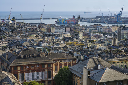 Italy, Liguria, Genoa, Rolli Palace listed as World Heritage by UNESCO in the Strada Nuova today via Garibaldi, the Palazzo Rosso or Brignole museum palace, departure of a ferry in the port in the background
