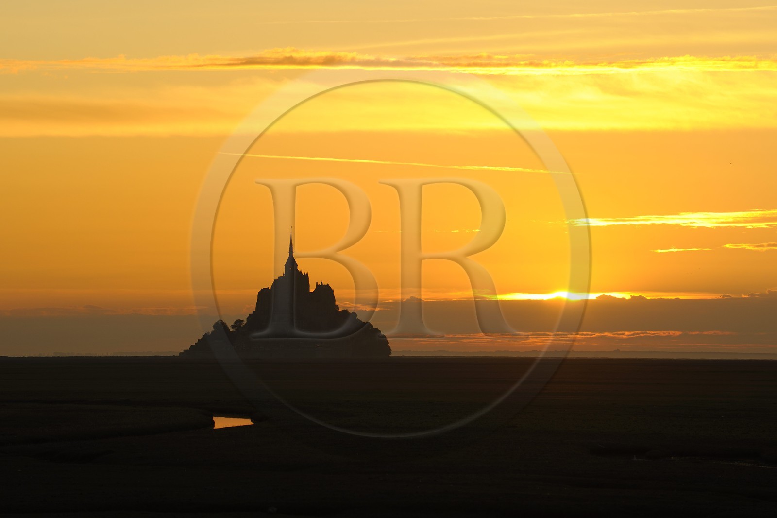 France, Manche, Bay of Mont Saint Michel, listed as World Heritage by UNESCO, Mont Saint Michel at sunset
