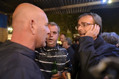 France, Haute Corse, Niolu (Niolo) region, Casamaccioli, la Santa di Niolu festivity, paghjella or Corsican polyphonic singing improvised by a group of friends, hand on the ear, in the refreshment stands