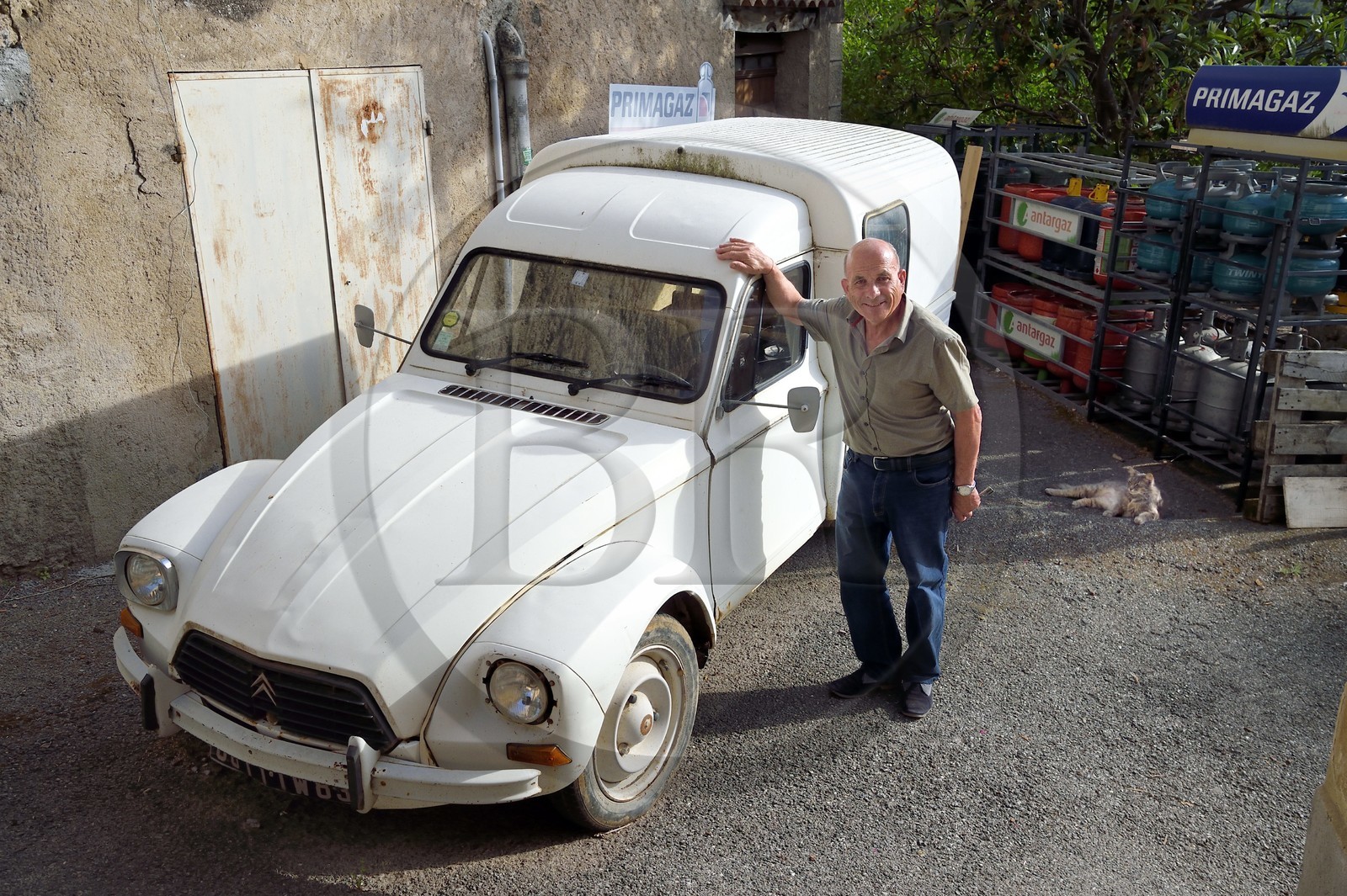 France, Var, the Dracenie, village of Chateaudouble, the mayor of the village Georges Rouvier in front of his Citroen Acadiane (1977-1988)