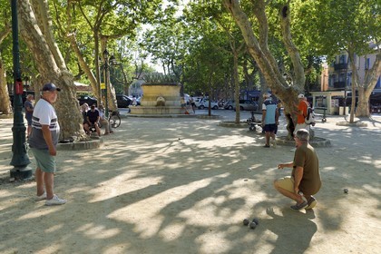 France, Var, Saint-Tropez, petanque players on the Place des Lices at night