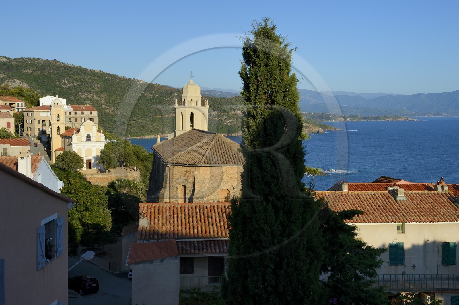 France, Corse du Sud, Cargese, Greek catholic church of Saint Spyridon (Eastern rite or Uniate) in the foreground and the catholic church (latin rite) in the background