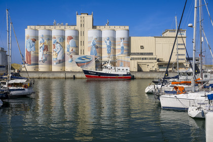 France, Vendee, Les Sables d'Olonne, the port, fresco retracing the history of the city painted on the silos of the Cavac cooperative by the Basque artist Taroe