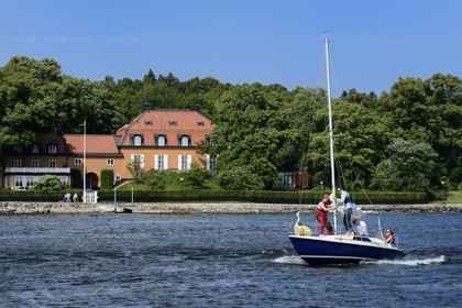 Sweden, Stockholm, Djurgarden, sailboat outside the Carl Johan Bonnier villa