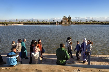 Morocco, High Atlas, Marrakech, Imperial city, Medina listed as World Heritage by UNESCO, La Menara listed as World Heritage by UNESCO, Saadian Pavilion and pool in the gardens, the snow-covered Atlas in the background