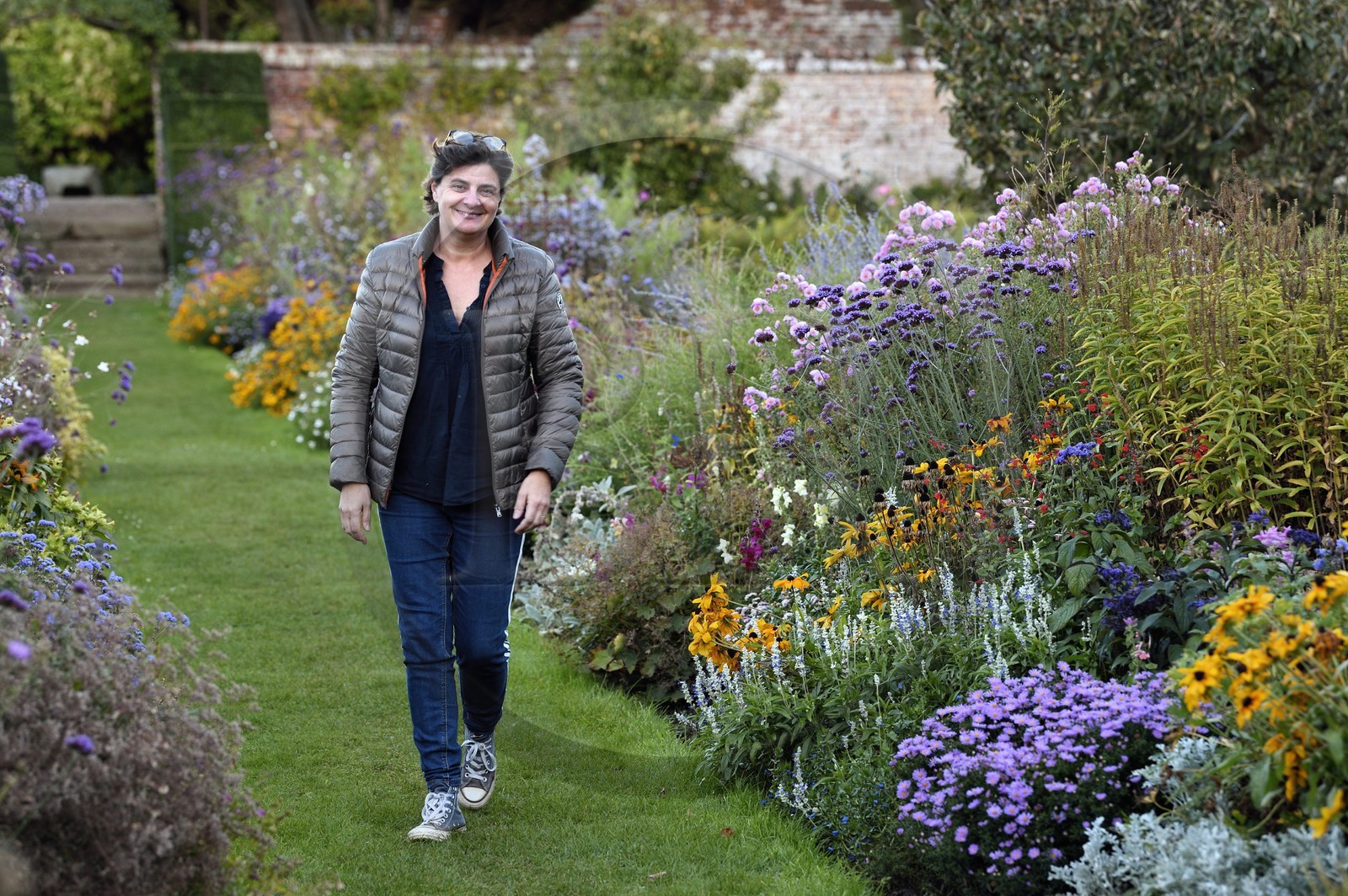 France, Seine-Maritime, Pays de Caux, Tourville sur Arques, château de Miromesnil, birthplace of the French writer Guy de Maupassant, the owner Nathalie Romatet in the very flowery vegetable garden