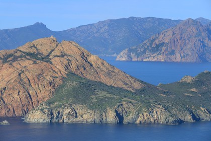 France, Corse du Sud, Golfe de Porto, listed as World Heritage by UNESCO, the Capo Rosso and the Genovese Tower of Turghiu (Turghio) in the background (aerial view)