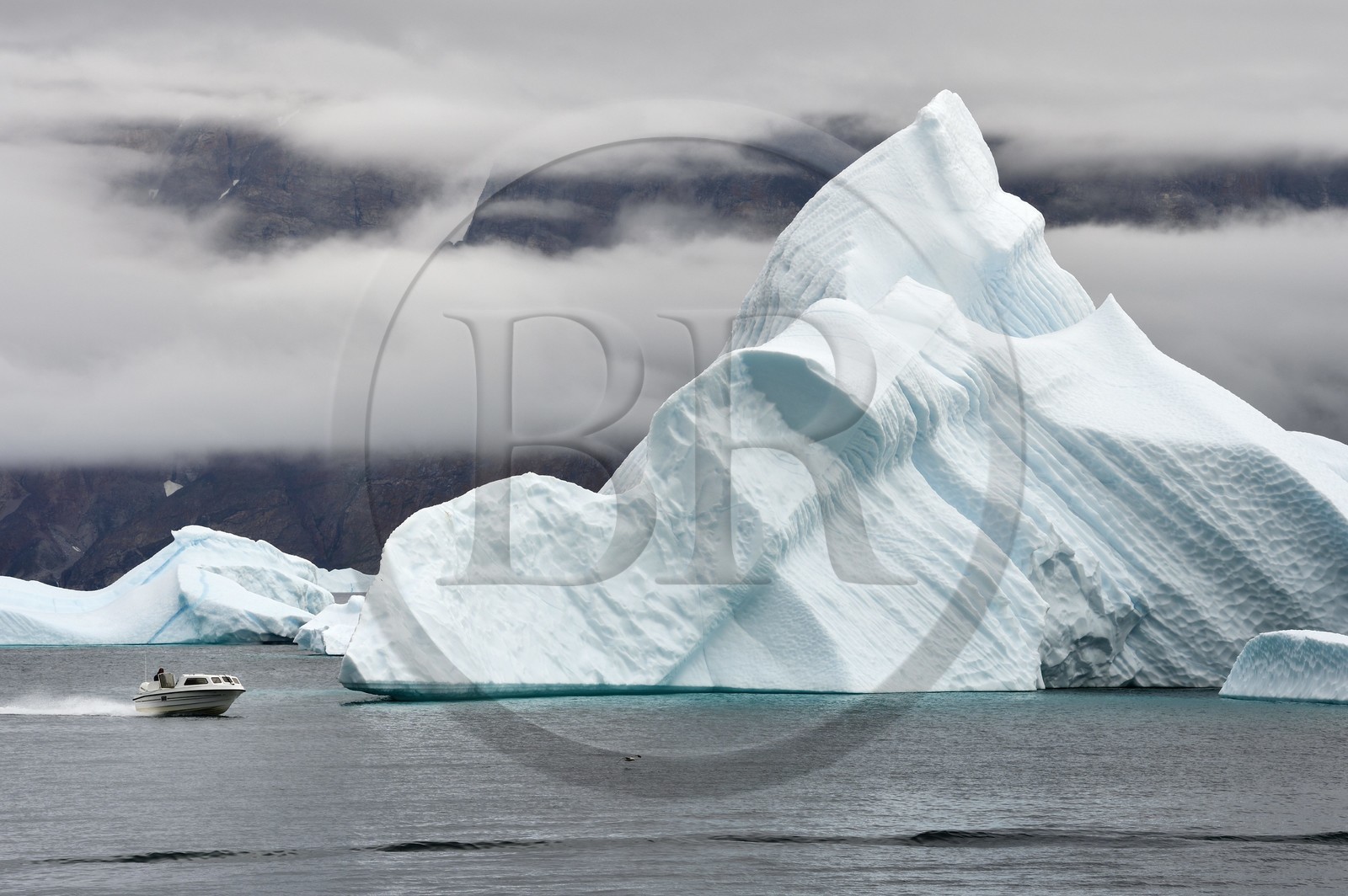 Greenland, west coast, Baffin bay, fishing in front of icebergs in Uummannaq fjord