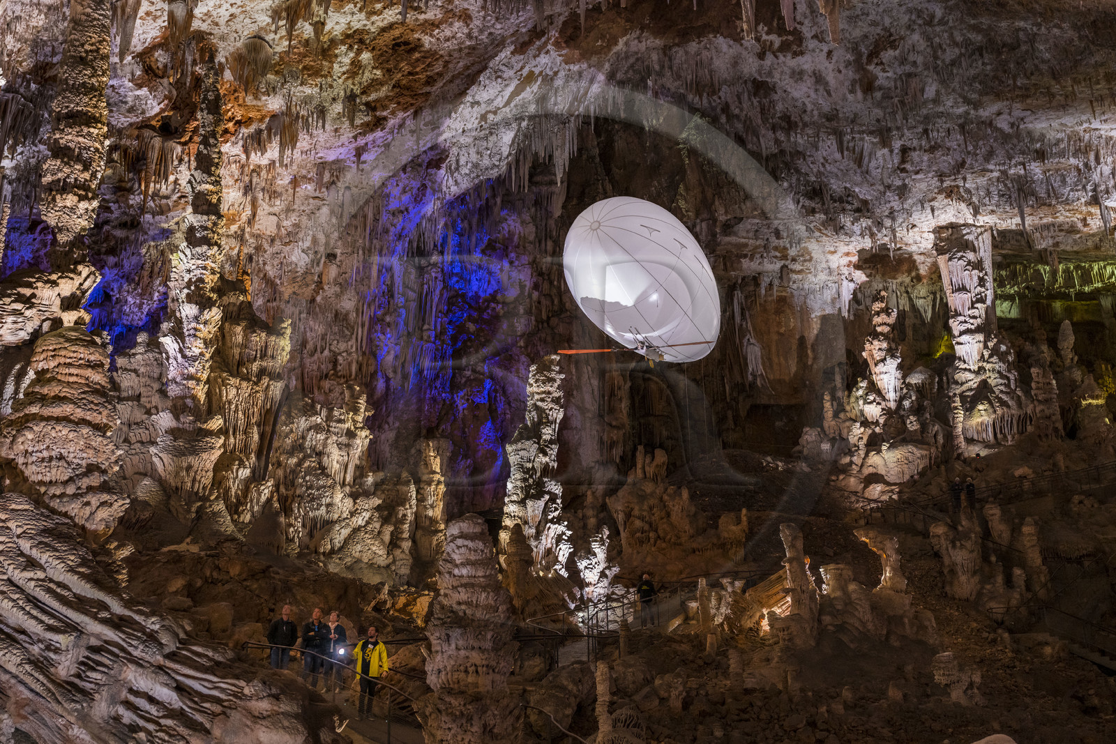 France, Gard, Mejannes-le-Clap, grotte de La Salamandre (Salamander cave), discovery of the cave in Aéroplume®, an individual dirigible balloon inflated with helium which allows you to fly away by flapping your wings
