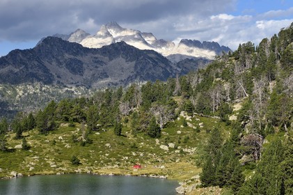 France, Hautes Pyrenees, Saint Lary Soulan and Vielle-Aure, hike on a variant of the GR10 between the Portet pass and the Bastan lakes on the edge of the Neouvielle nature reserve, lower Bastan lake and the Neouvielle massif in the background