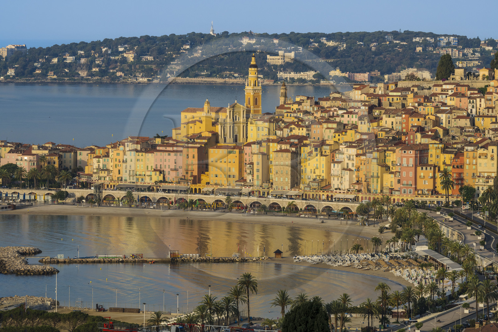 France, Alpes-Maritimes, Menton, the Sablettes beach at the foot of the old town overlooked by the Basilica of Saint Michael