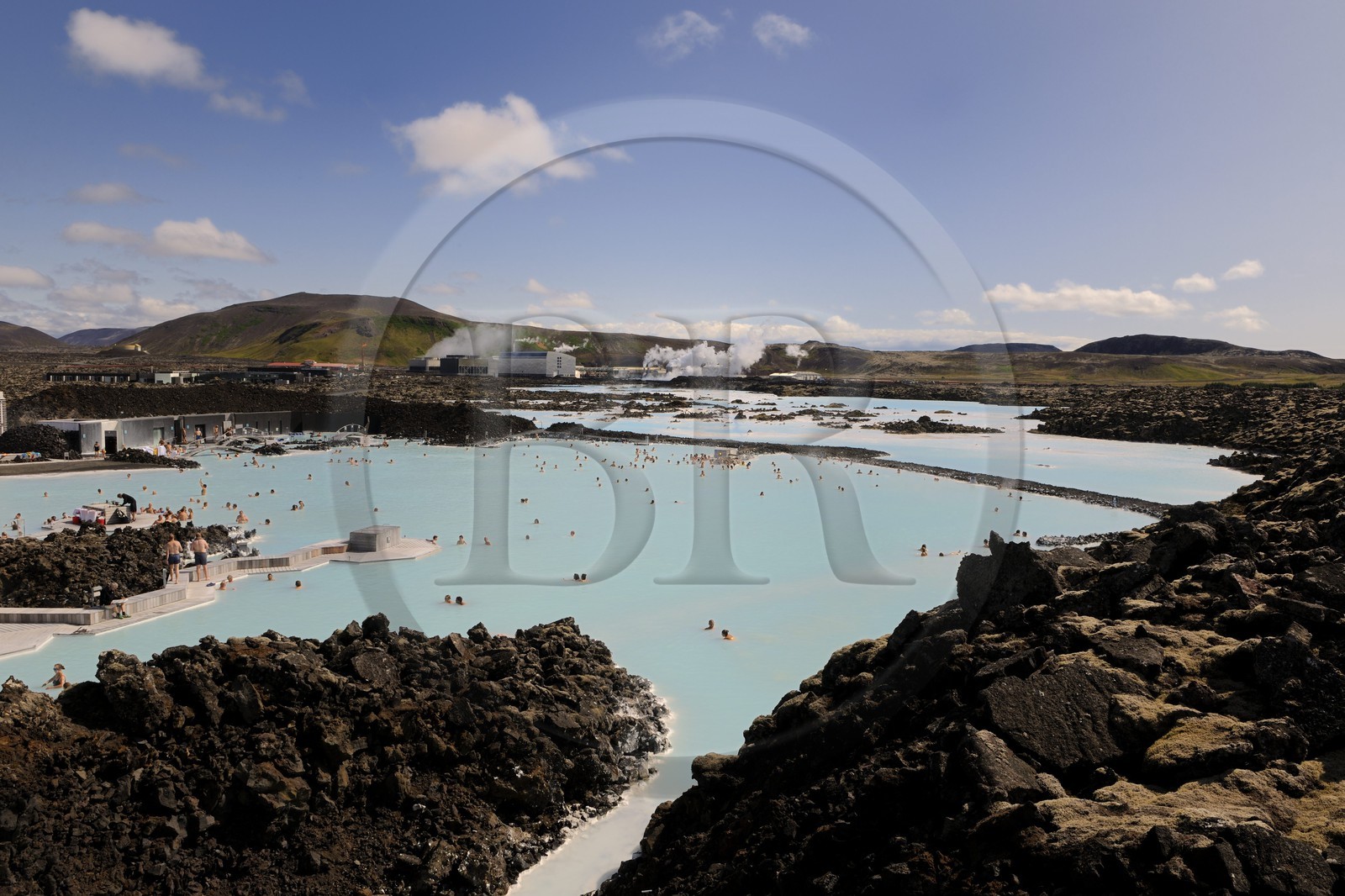 Iceland, Sudurnes Region, Grindavik, the Blue Lagoon with the geothermical factory in the background