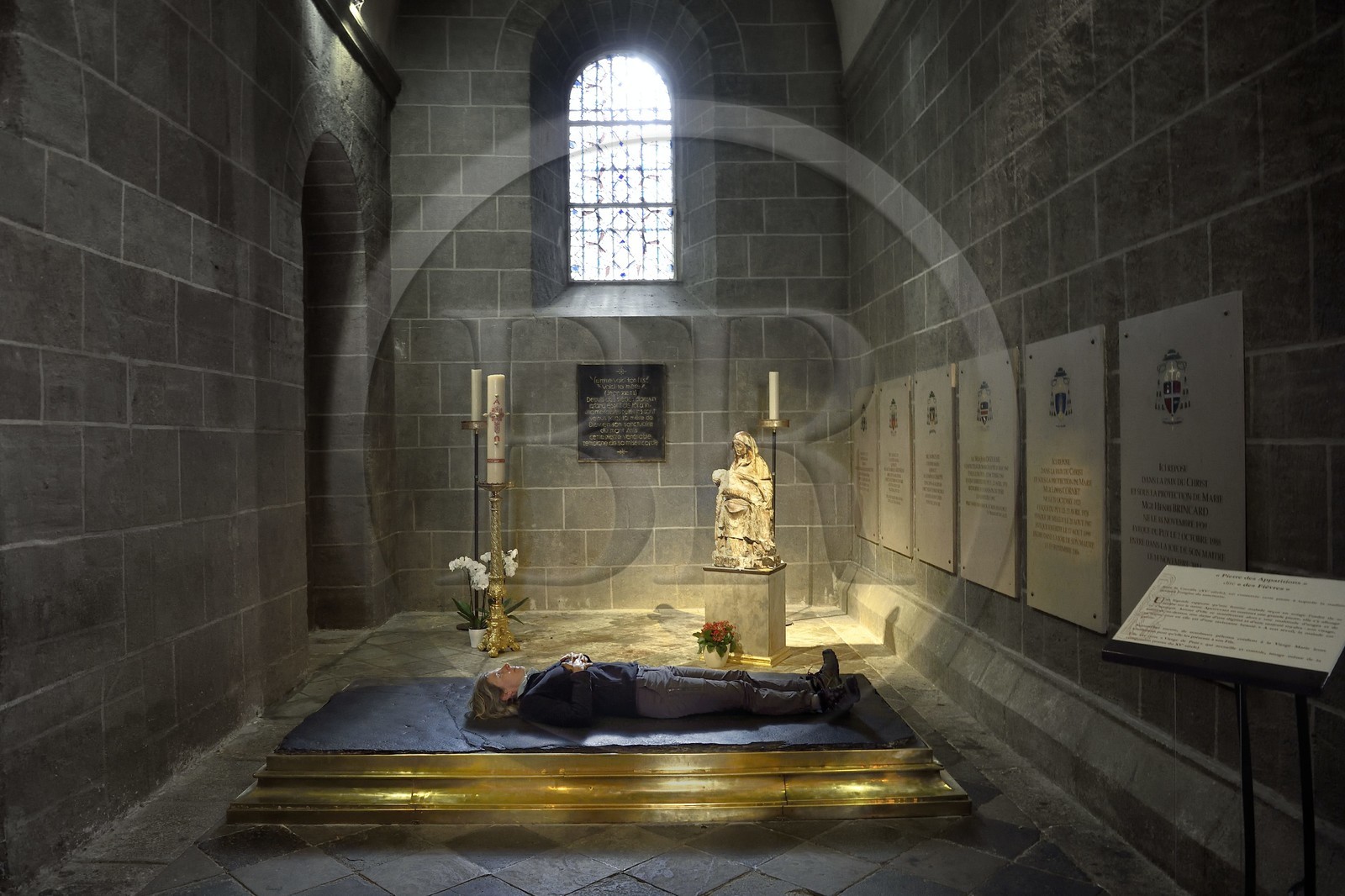 France, Haute Loire, Le Puy en Velay, Routes of Santiago de Compostela, the 12th century Our Lady (Notre-Dame-de-l'Annunciation) cathedral listed as World heritage by UNESCO, Chapel of the Holy Crucifix, large phonolith slab called the Stone of Fevers or Stone of Apparitions (of the Virgin)