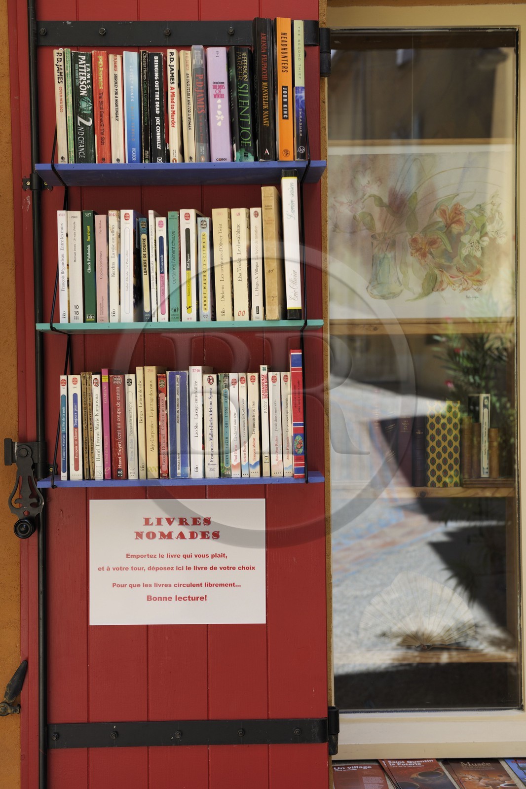 France, Gard, region of the Pays d'Uzege, Saint-Quentin-la-Poterie, free loan of books in the street