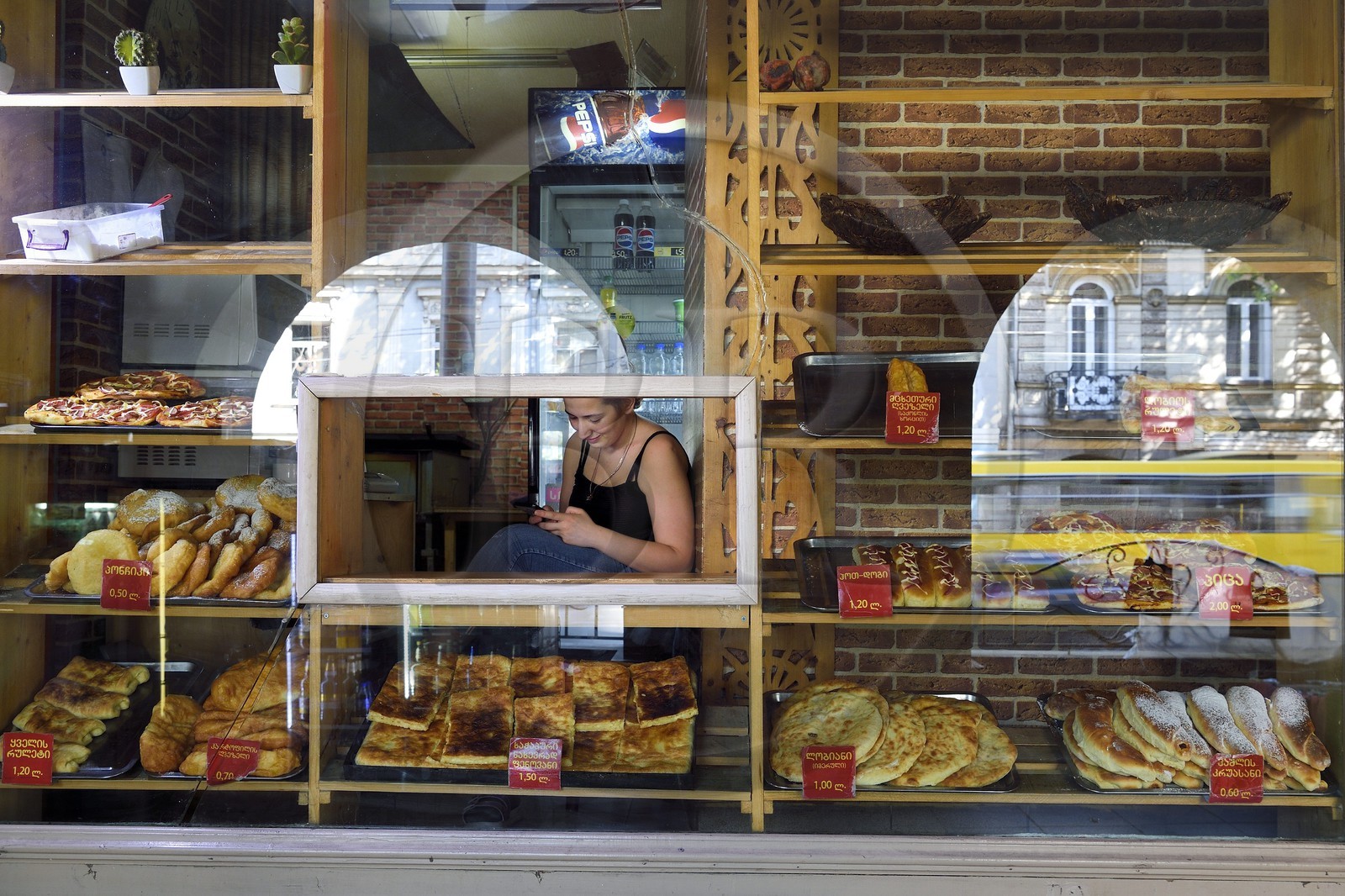 Georgia, Tbilisi, Merab Kostava street, khachapuri saleswoman