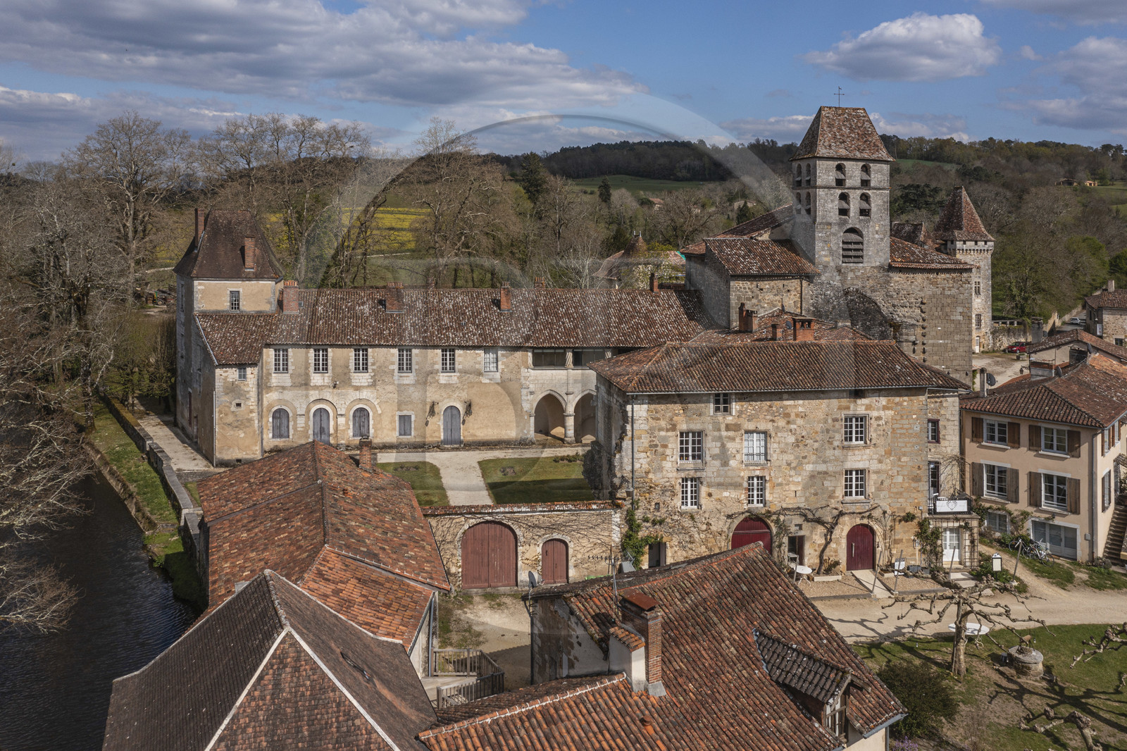 France, Dordogne, Périgord Vert, Saint Jean de Cole, labelled Les Plus Beaux Villages de France (The Most Beautiful Villages of France), the former priory and the St. John the Baptist (Saint-Jean-Baptiste) church bell tower (aerial view)