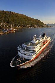 Norway, Troms County, Tromso harbour, the Coastal Express (Hurtigruten) in Tromsesundet Fjord