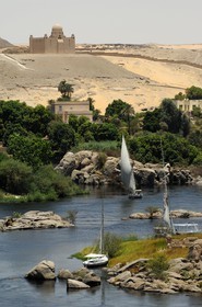 Egypt, Upper Egypt, Nile Valley, Aswan, felucca on the Nil and the Agha Khan mausoleum on the western bank