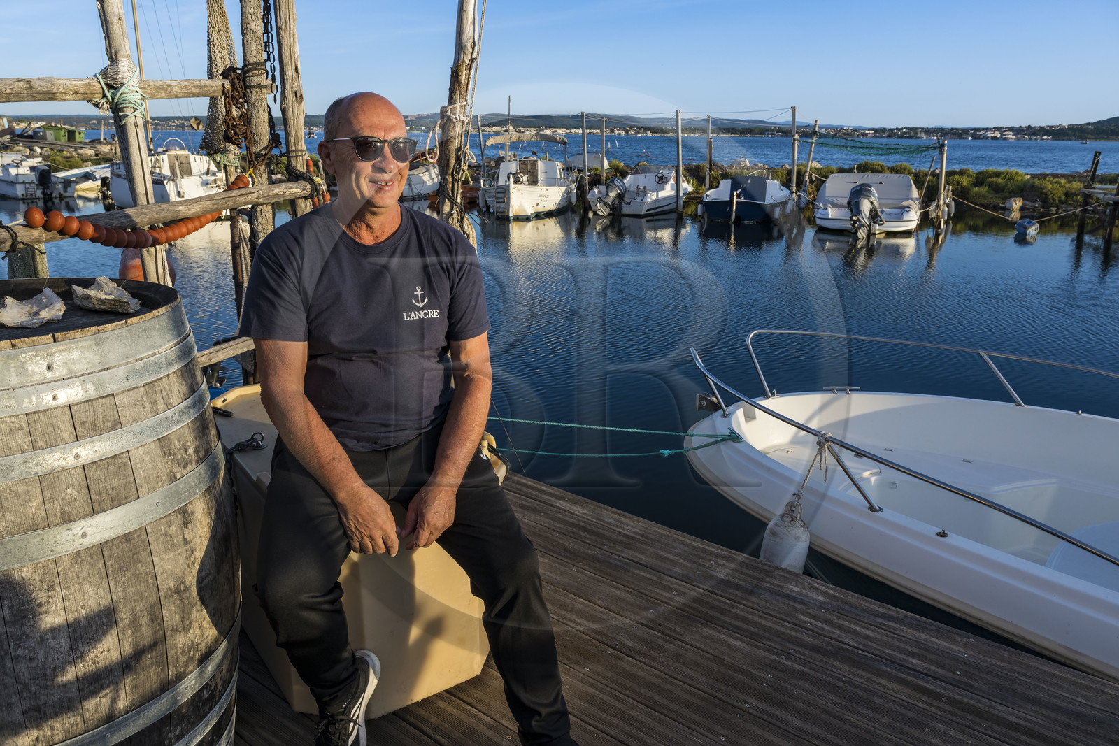 France, Hérault (34), Sète, quartier de la Pointe Courte, le petit port du quartier de pecheurs sur les rives de l'étang de Thau, le pêcheur Robert Rumeau