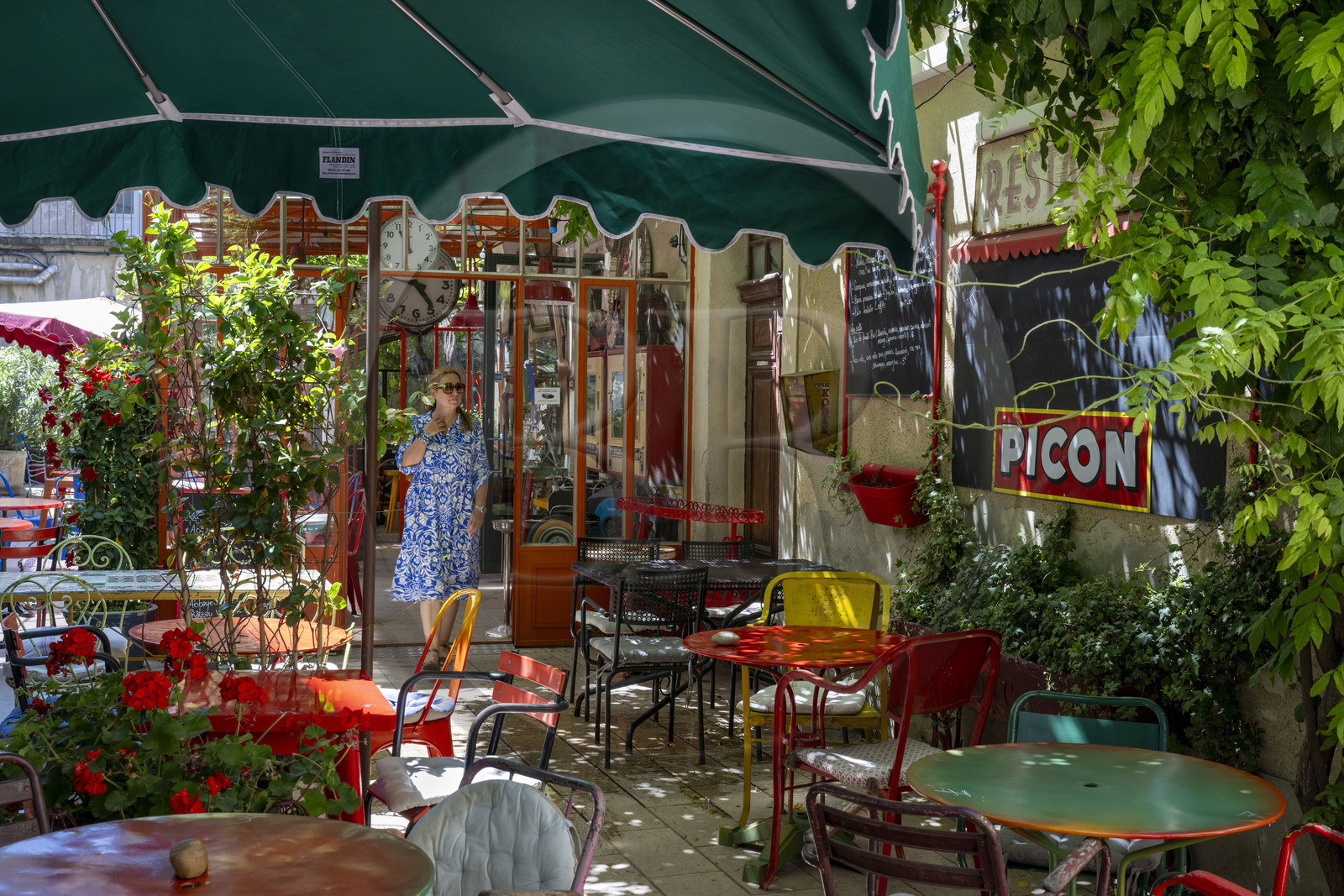 France, Bouches du Rhone, Regional Natural Park of the Alpilles, Saint Remy de Provence, terrace of the restaurant Le Bistrot de Marie, an address appreciated by Charles Aznavour