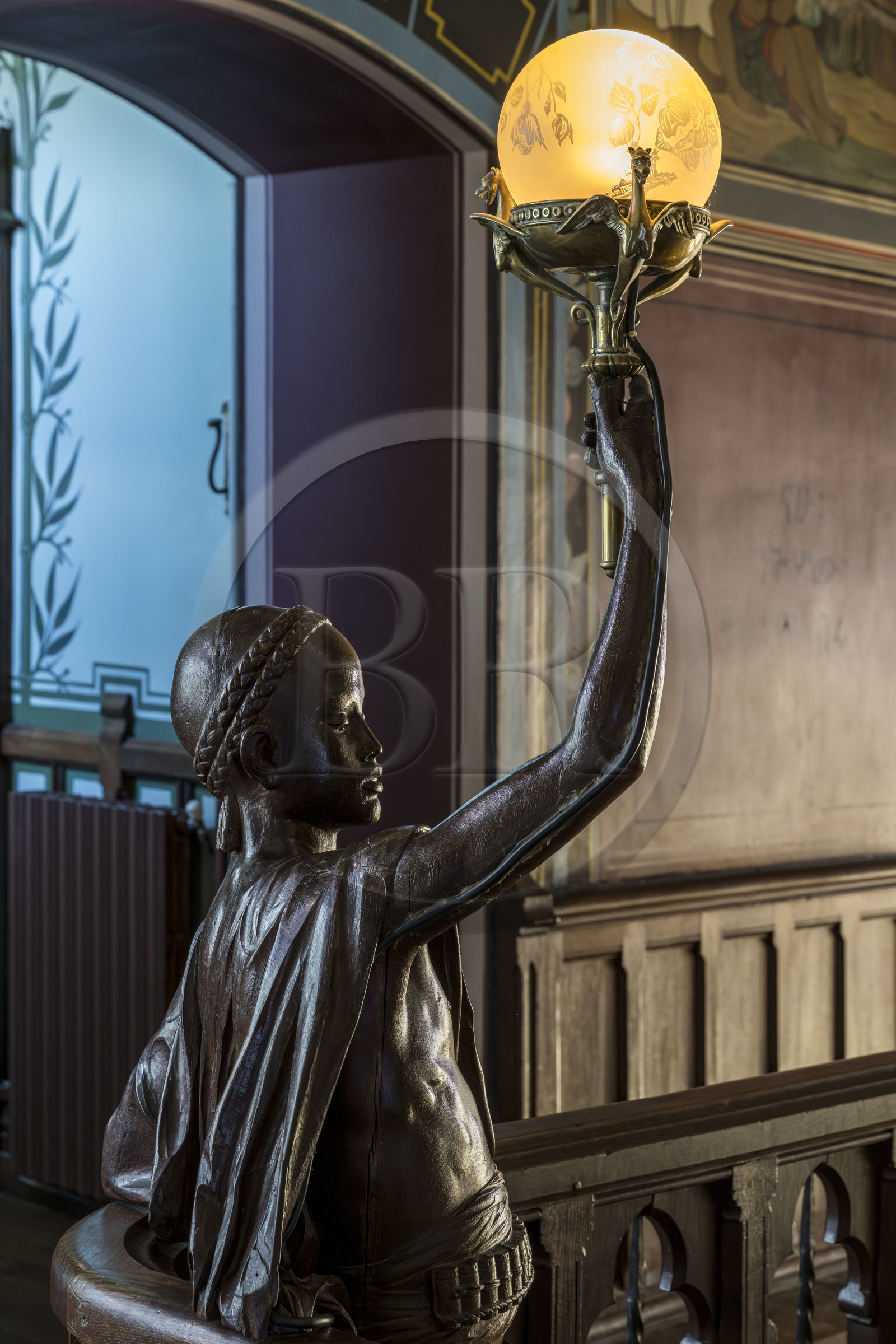 France, Pyrenees Atlantiques, Basque Country coast, Hendaye, Abbadia castle built in 1870 by Eugène Viollet-le-Duc for Antoine d'Abbadie d'Arrast, the grand staircase, torchiere lamp statue representing Abdullah former Ethiopian slave freed and dead under the commune of Paris
