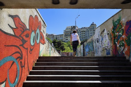 Georgia, Tbilisi, passage under fast tracks with walls covered with graffiti