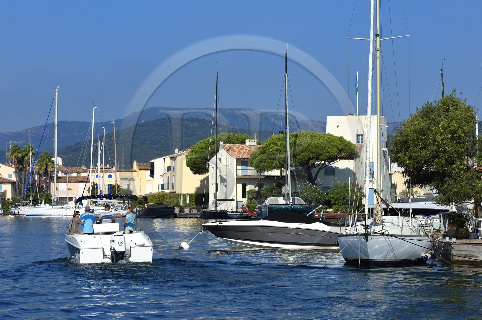 France, Var, Gulf of St Tropez, the Port Grimaud seaside town, houses with private jetty