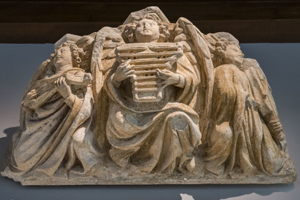 France, Paris, Musée de Cluny - Musée national du Moyen-Age (Middle Ages Museum in the former Hotel de Cluny), Cul-de-lampe representing three musical angels from the Saint-Jean-de-Latran church in Paris, circa 1400