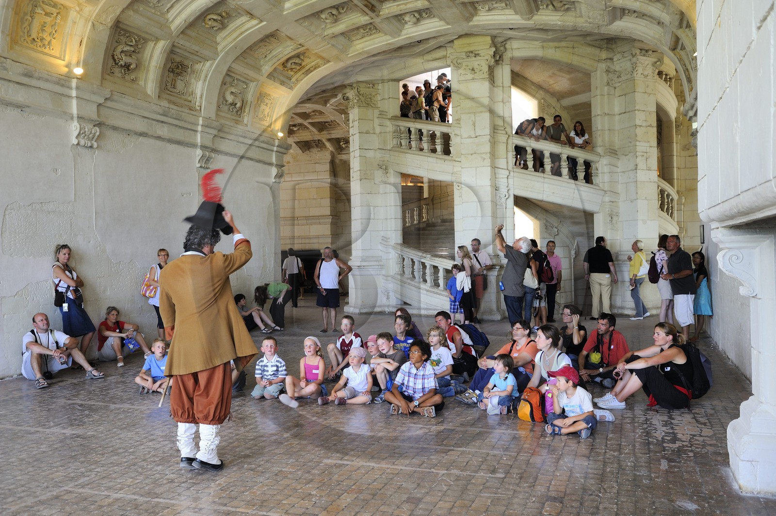 France, Loir et Cher, Loire Valley listed as World Heritage by UNESCO, Chateau de Chambord, guided tour in costume for children in front of the double helix staircase attributed to Leonardo Da Vinci
