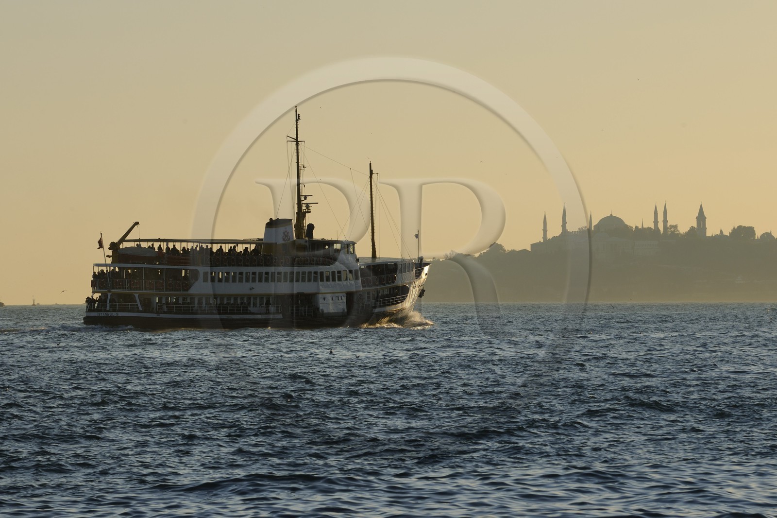Turkey, Istanbul, Ferry on the Bosphorus and the Golden Horn in the background