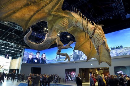 United Kingdom, Hertfordshire, Leavesden, Leavesden Film Studios, Harry Potter Studio Tour London, the scene of the eight Harry Potter movies' making of, giant flying dragon overlooking the visitors at the entrance of the exhibition