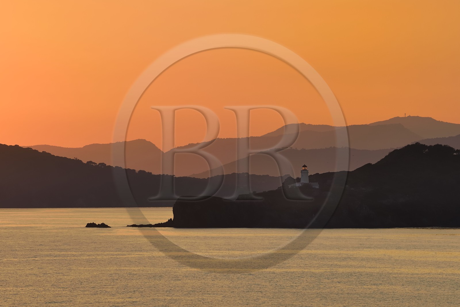 France, Var, Iles d'Hyeres, Parc National de Port Cros (National park of Port Cros), Porquerolles island, view from the Fort du Petit Langoustier on the lighthouse of Grand-Ribaud and the Peninsula of Giens