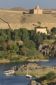 Egypt, Upper Egypt, Nubia, Nile Valley, Aswan, Elephantine Island and the Agha Khan mausoleum in the background on the western bank