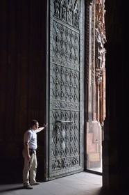 France, Bas Rhin, Strasbourg, old town listed as World Heritage by UNESCO, Notre Dame Cathedral, Sacristan Michel Bolli opens the main door of the Western facade in the early morning