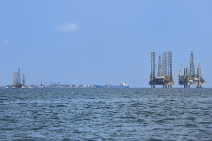 Gabon, Ogooue-Maritime Province, Port-Gentil, oil rigs in the in the Cape Lopez bay and the refineries from Port Gentil in the background