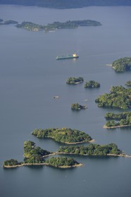 Panama, Panama Canal, Panamax cargo and small islands on Gatun Lake (aerial view)