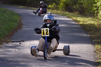 France, Haute Loire, Polignac, Drift Trike, skidding a tricycle down a hill