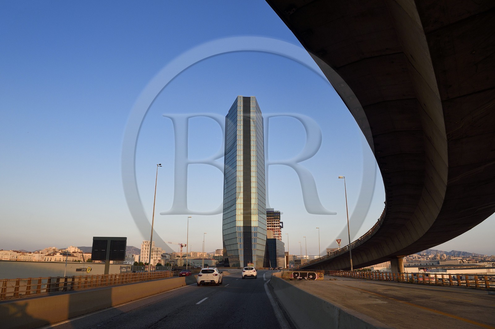 France, Bouches du Rhone, Marseille, Euromediterranee area, Littoral A55 highway at the foot of the tower CMA CGM by architect Zaha Hadid