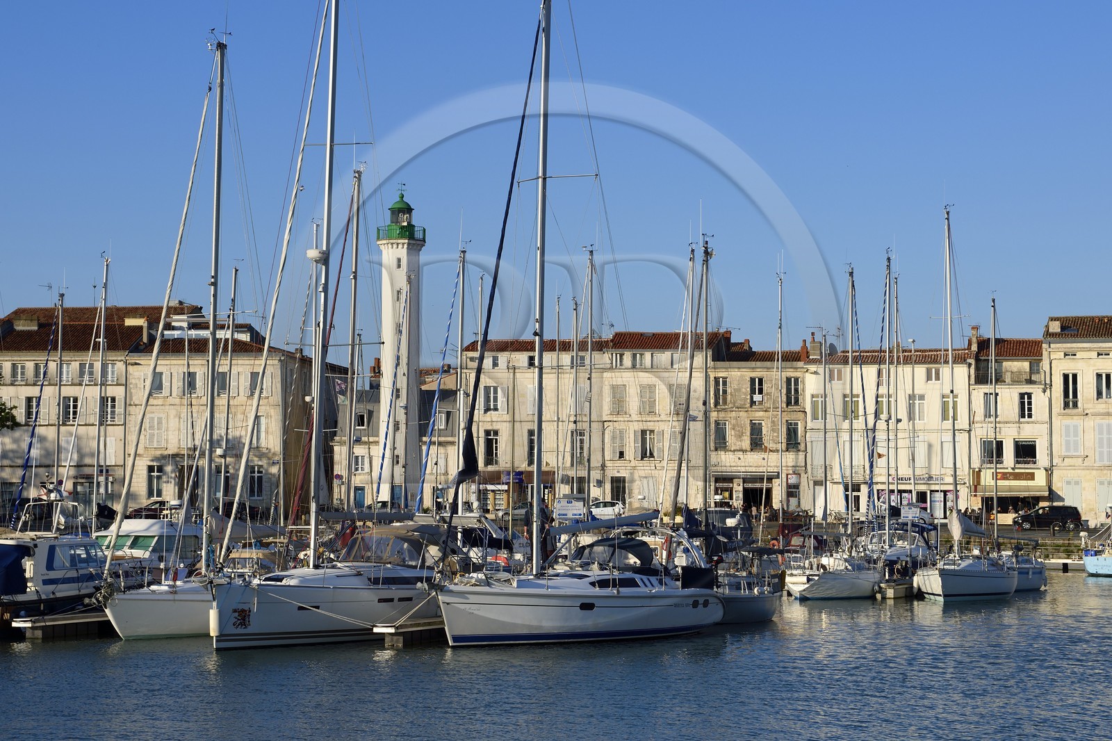 France, Charente-Maritime, La Rochelle, the wet dock of the Old Port and its lighthouse