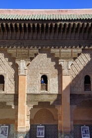 Morocco, High Atlas, Marrakech, Imperial city, Medina listed as World Heritage by UNESCO, Ali Ben Youssef Medersa (Koranic school), arched window with ornamental stucco work