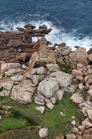 France, Cotes-d'Armor, Cote de Granit Rose (the Pink Granite coast), Perros Guirec, Ploumanach, Pointe de Squewel and Mean Ruz Lighthouse (aerial view)