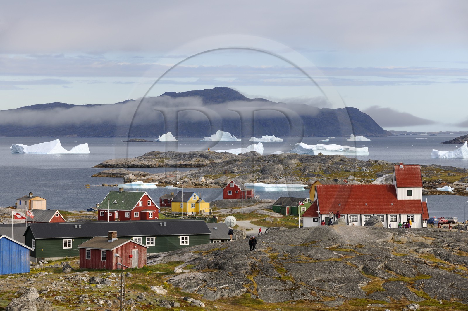 Greenland, town of Nanortalik in the Southern area and icebergs in the bay