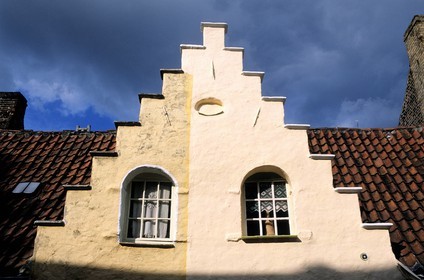 Belgium, West Flanders, Bruges (Brugge), frontage of a house with gables. They are called huidenvettershuis