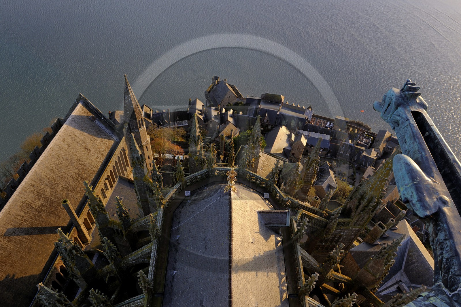 France, Manche, Mont Saint Michel, listed as World Heritage by UNESCO, Apse and the bay seen from the spire at dawn