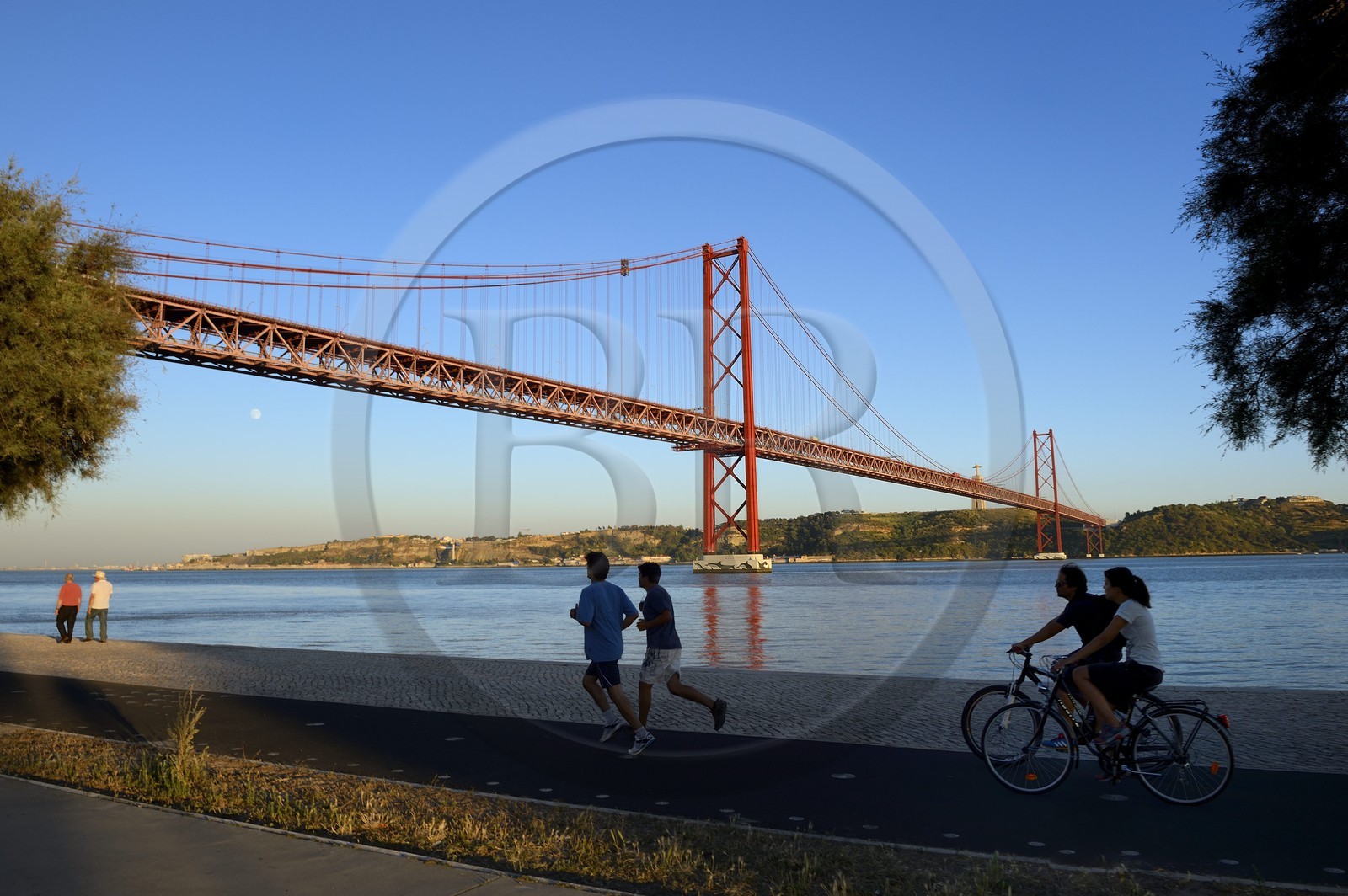 Portugal, Lisbon, 25 de Abril bridge on Tagus river and the Cristo Rei (Christ the King)