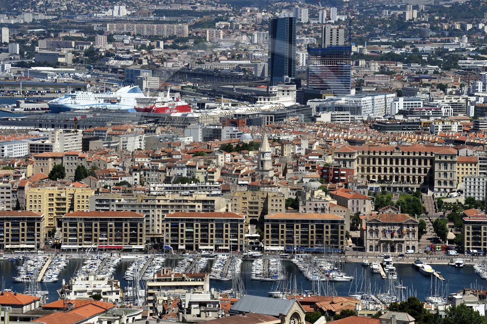 France, Bouches du Rhone, Marseille, Euro-Mediterranean area, Le Vieux Port, Le Panier district, Marseille seaport, CMA-CGM Tower by architect Zaha Hadid in the background, the former hotel Dieu now hotel Intercontinental in the center on the right in front of the City Hall