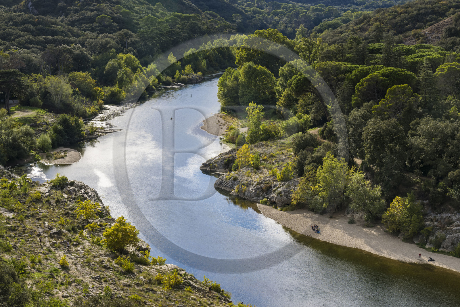 France, Gard, Pont du Gard classified World Heritage by UNESCO, Grand Site de France, the Gardon river at the foot of the Roman aqueduct bridge