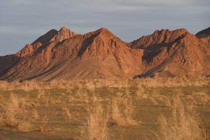 Iran, Isfahan province, Dasht-e Kavir desert, Mesr in Khur and Biabanak County, the mountain range of Dareh bidan at sunset